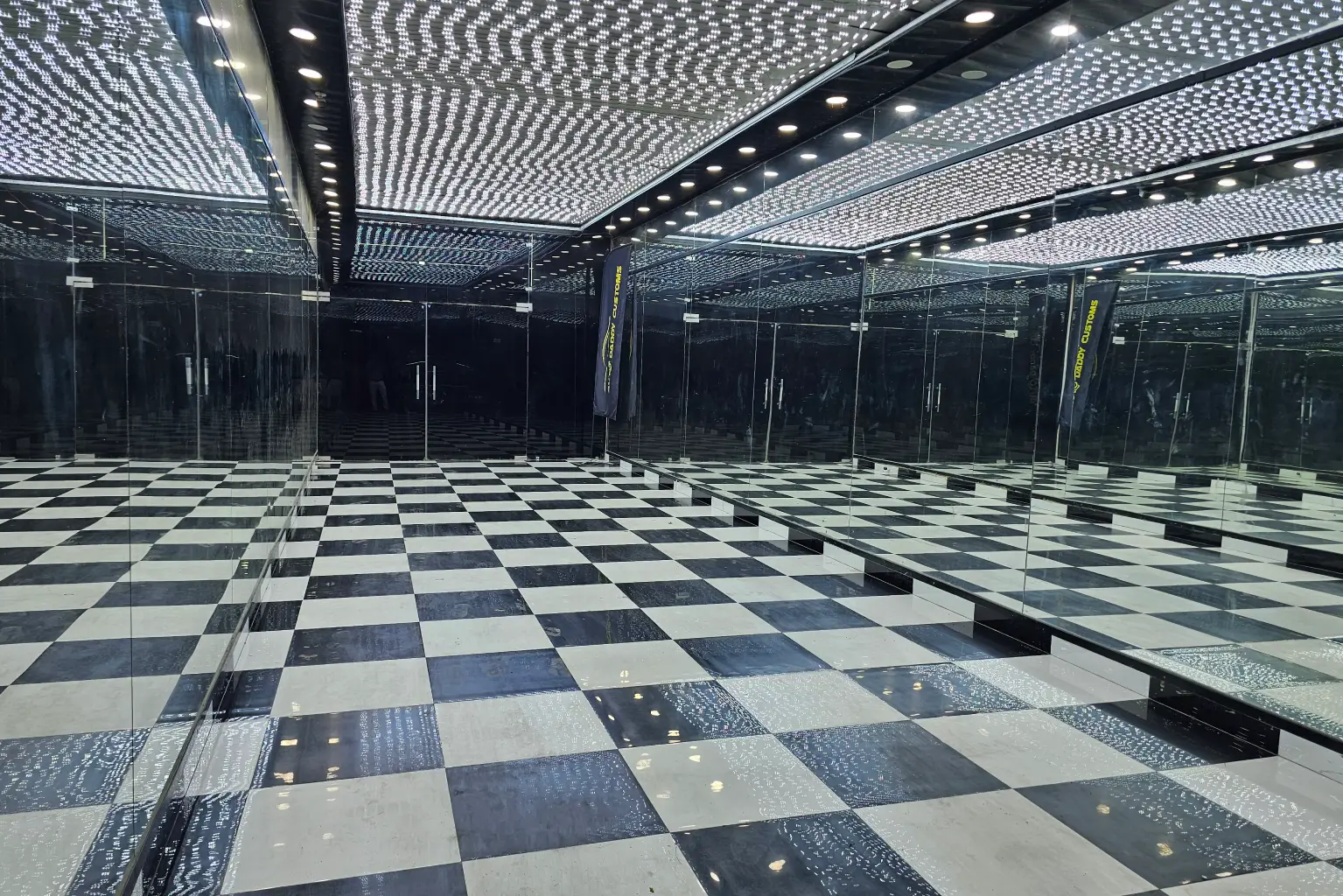 reception interior design for Auto Daddy Custom automotive showroom