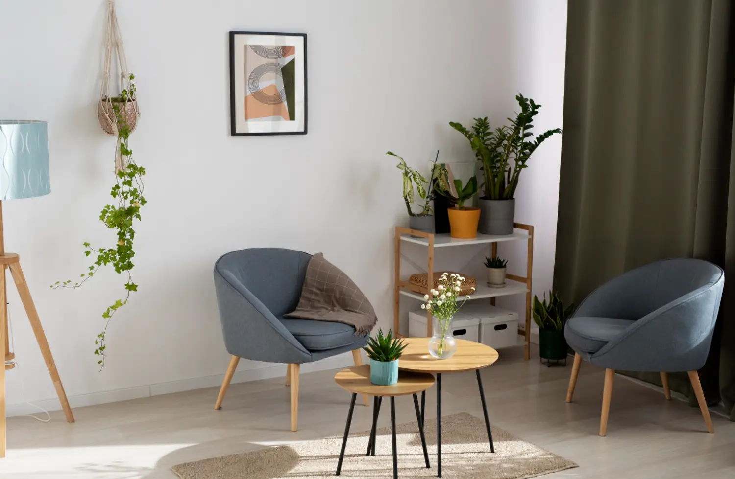 Cozy Lounge Corner Interior Design Cozy lounge corner with blue chairs, indoor plants and soft natural light